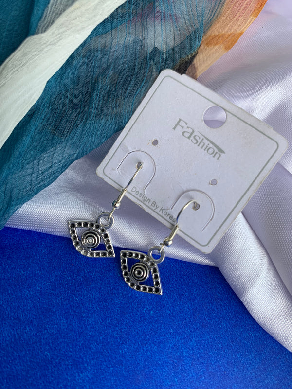 Evil eye silver earring