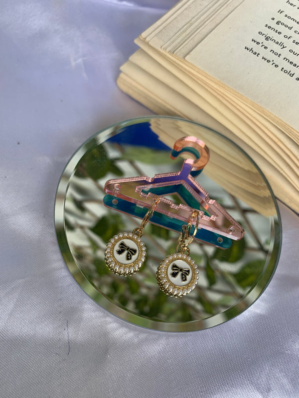 Pearl circle bow earring