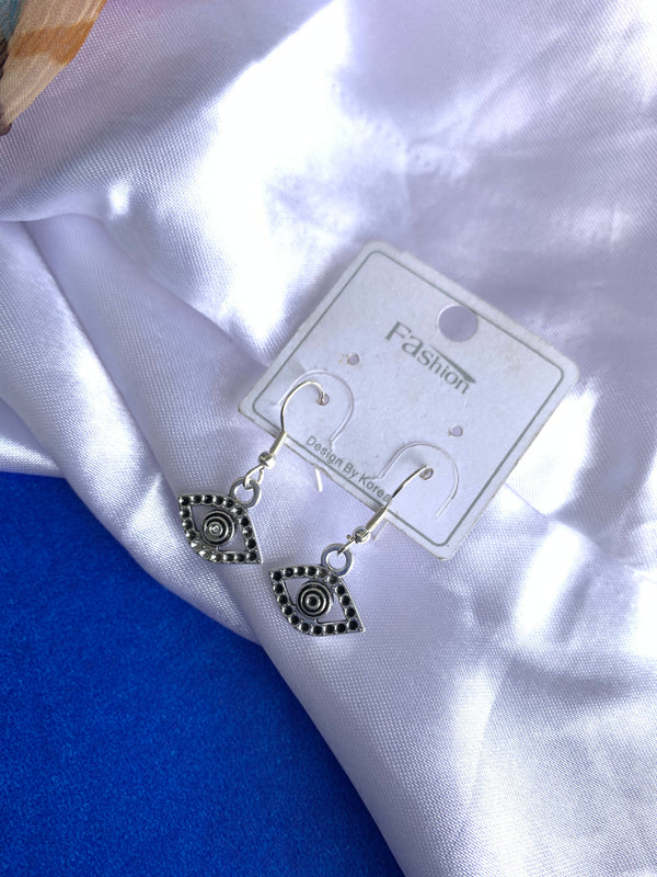Evil eye silver earring