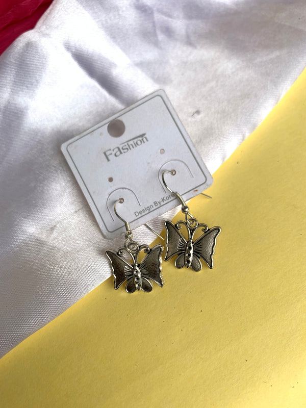 Subtle butterfly drop earring