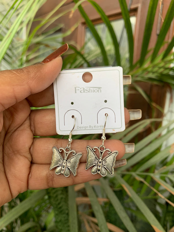 Subtle butterfly drop earring