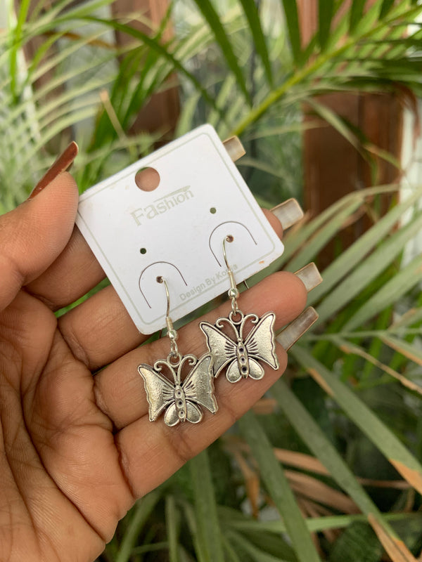 Subtle butterfly drop earring