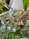 Statement unicorn drop earring