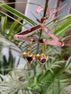 Golden heart melt earring